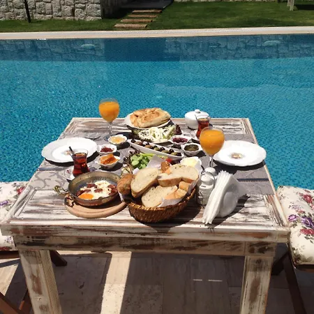 Ruezgar Guelue Butik אלאקאטי